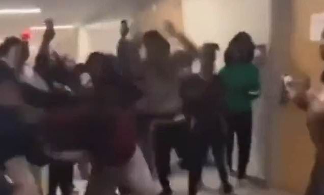 Shocking moment mob of ninth-grade students viciously attack female assistant principal