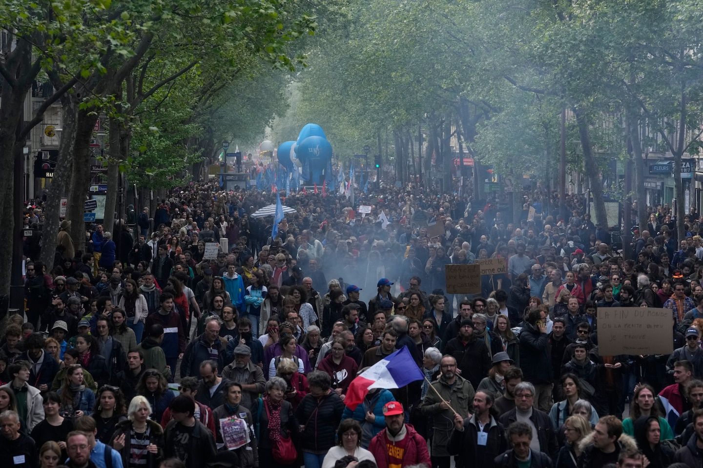 French protest Macron retirement law on May Day