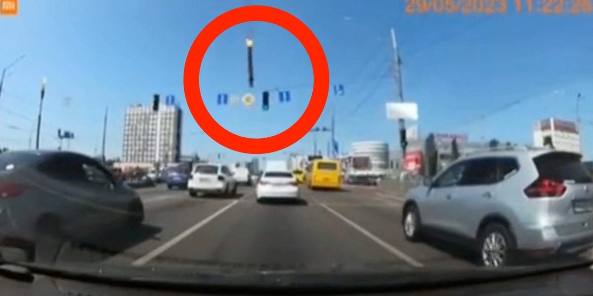 Dashcam Footage Shows a Missile Narrowly Missing a Moving Car in Kyiv