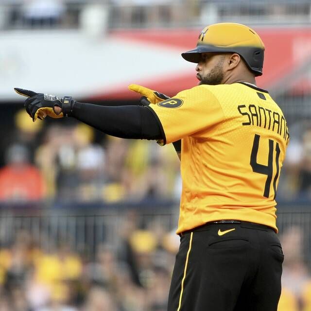 Carlos Santana's walk-off homer in 9th caps Pirates' comeback win over Brewers