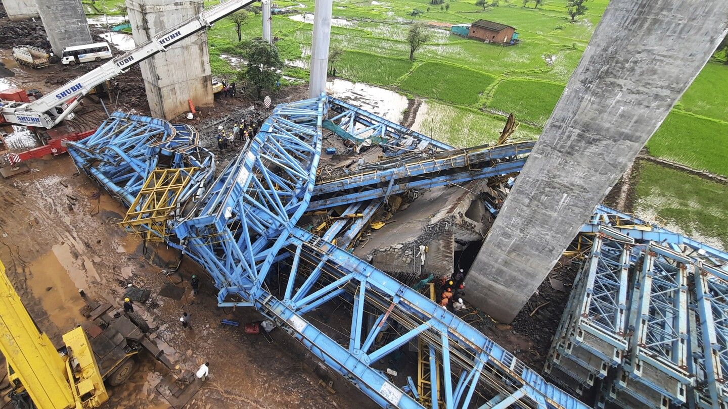 16 workers killed in the collapse of a crane being used to build a bridge in India