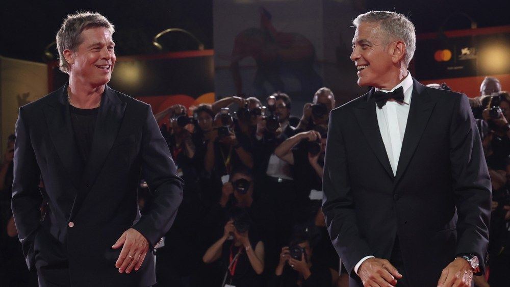 Brad Pitt and George Clooney Get Venice Standing Ovation for 'Wolfs'