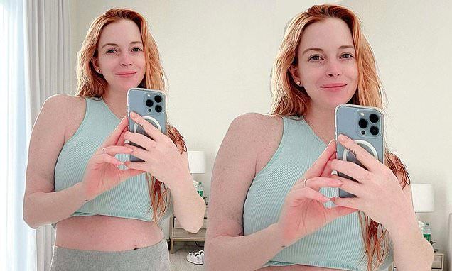 Lindsay Lohan reveals her postpartum body just TWO weeks after welcoming son Luai as star shares empowering message: 'I am so proud of what this body was able to accomplish'