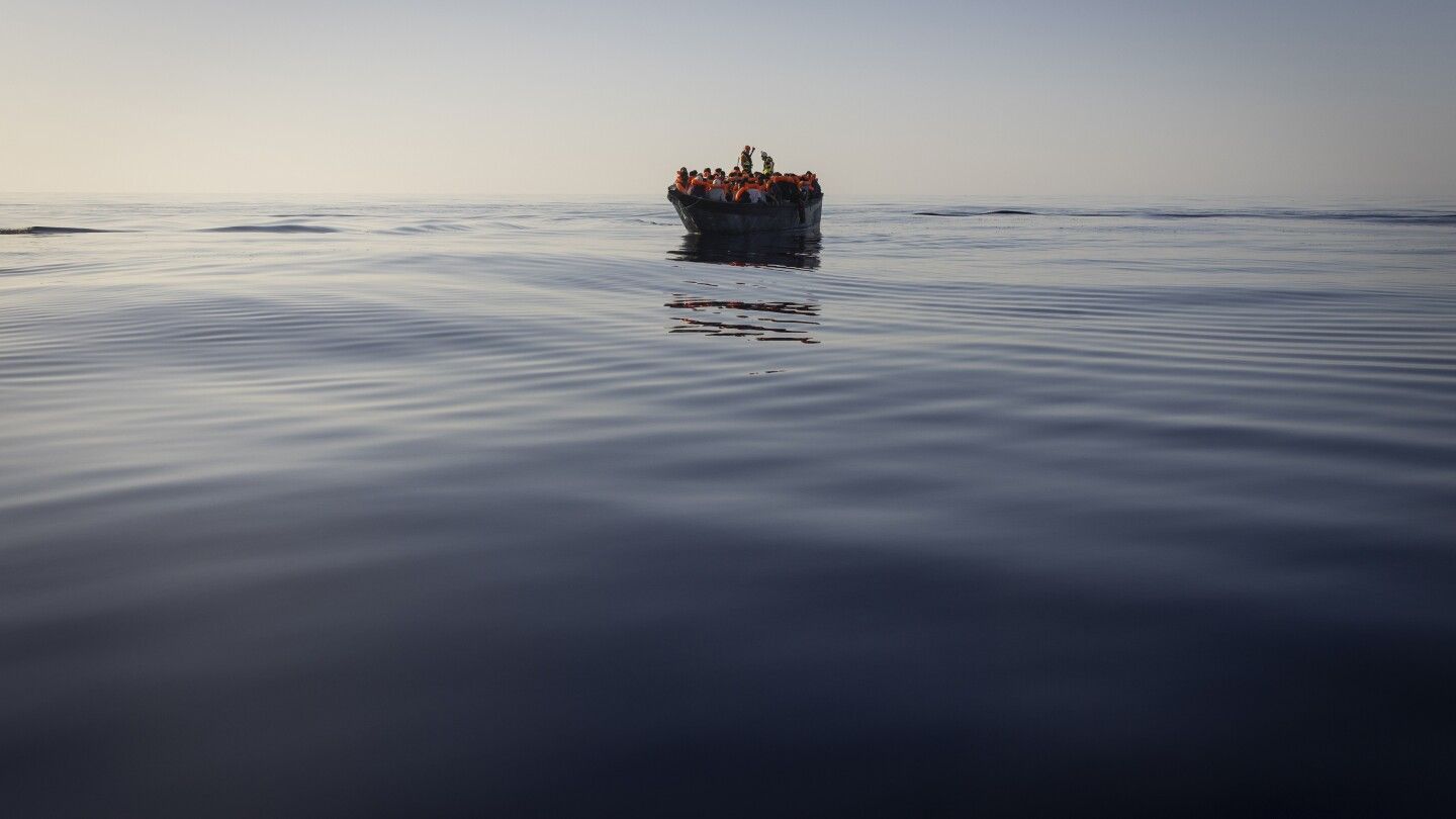 Greek authorities charge 2 migrants for destroying dinghy carrying 40 as rescue boat approached