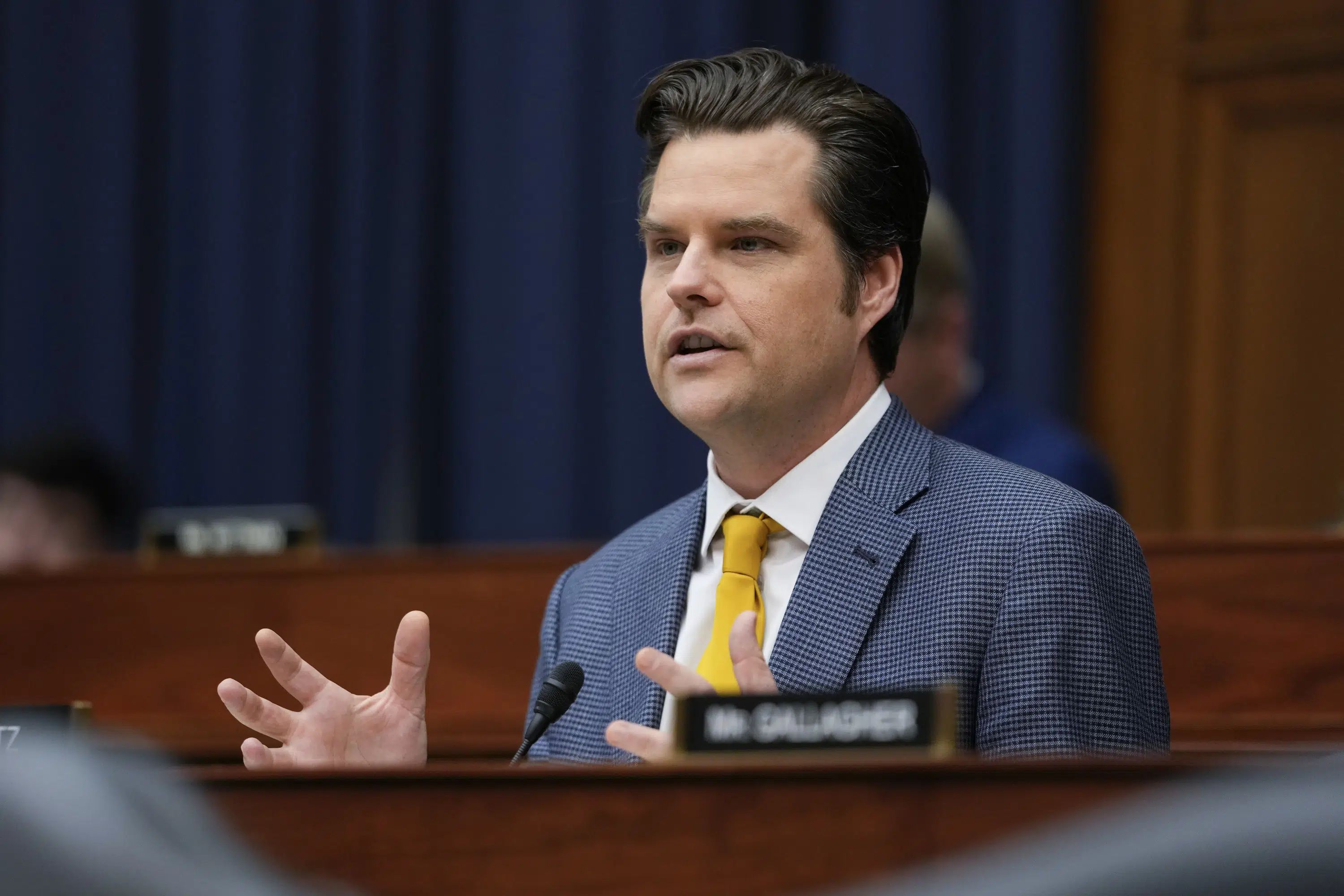 Woman is 2nd accused of throwing drink at US Rep. Matt Gaetz