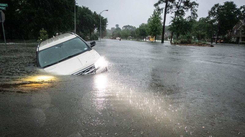 Evacuations ordered, homes damaged in Texas as rivers surge to Hurricane Harvey levels