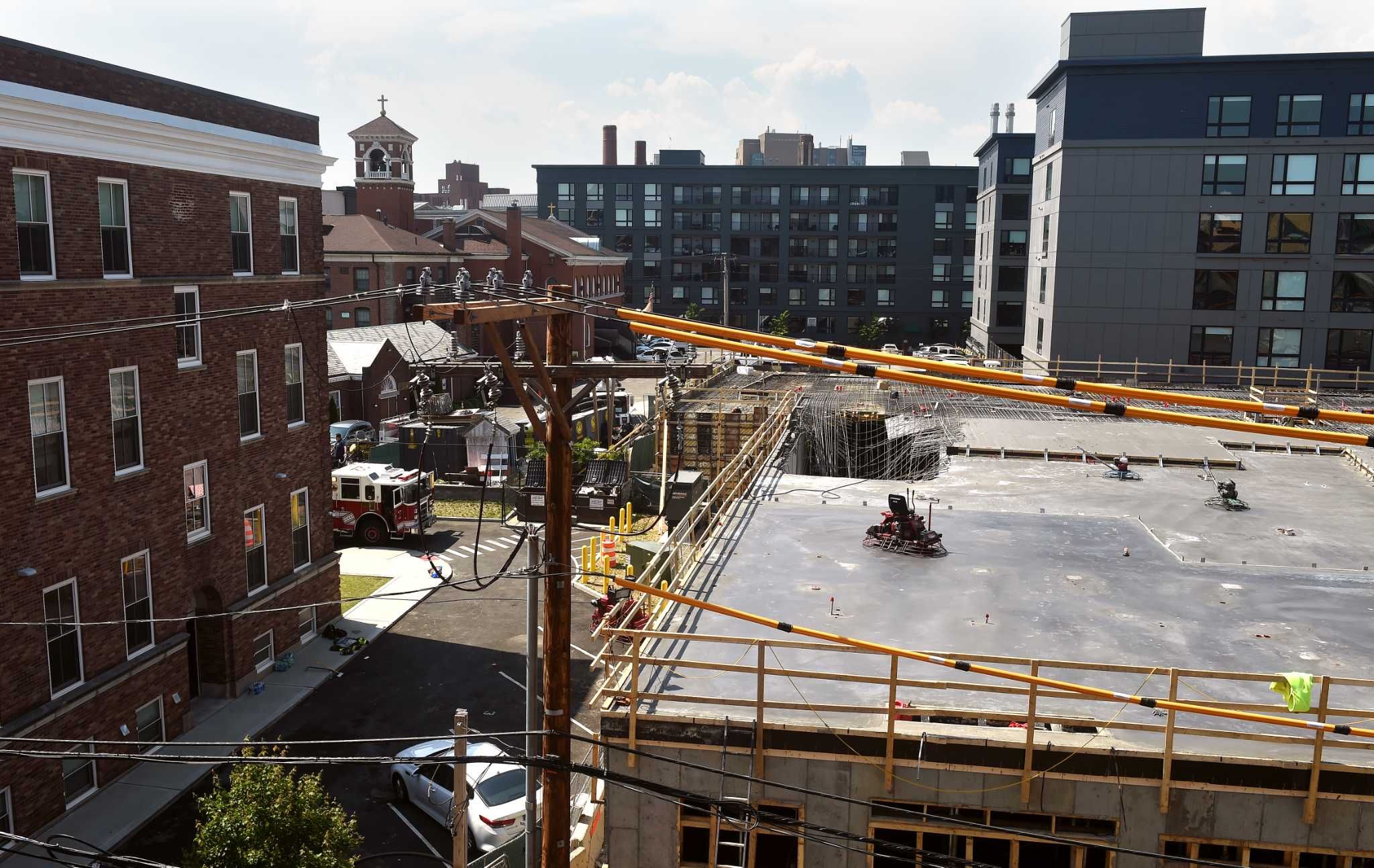 Workers were pouring 4M pounds of concrete as building collapsed