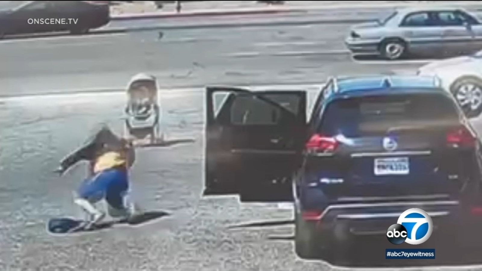 Video shows man rush to stop runaway stroller with baby right before it rolls into busy street