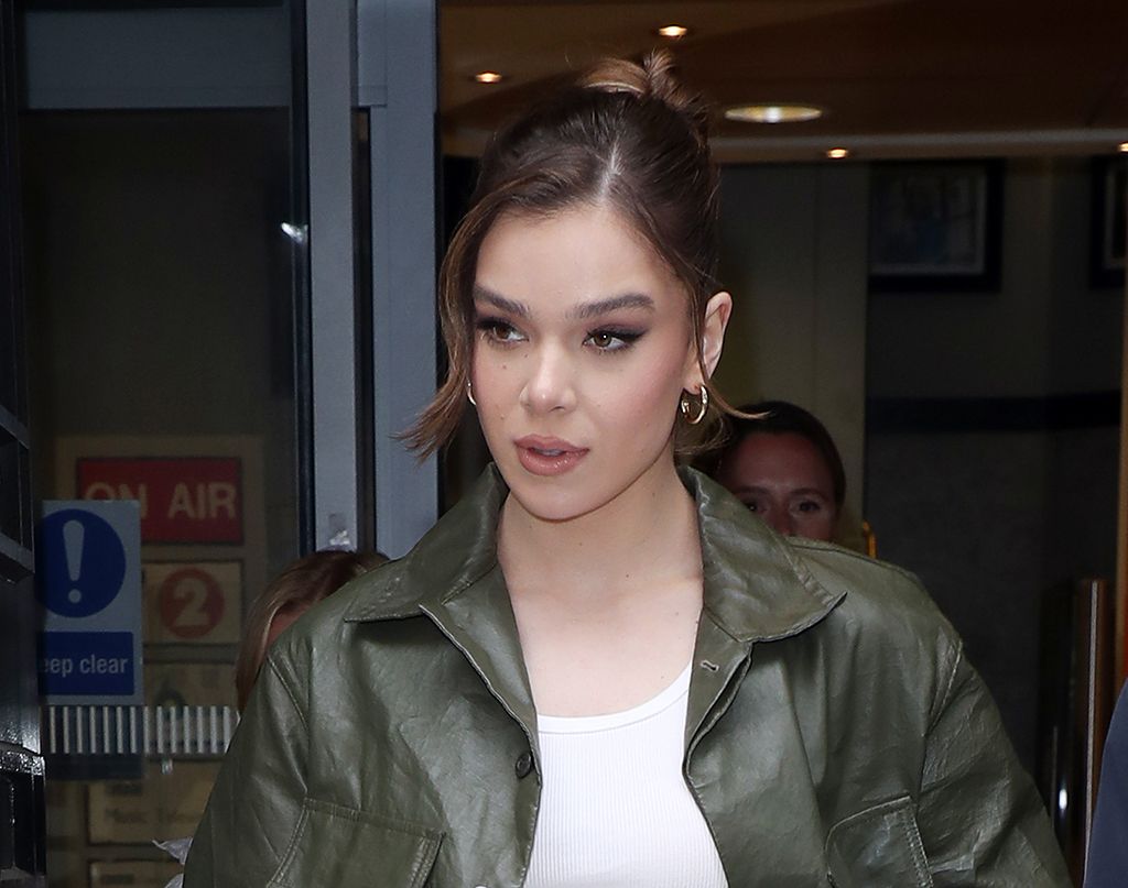 Hailee Steinfeld Visits BBC Radio 2 in Towering Tan Platform Boots