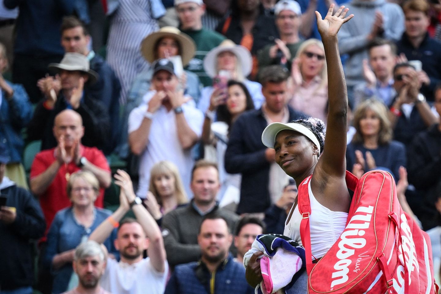 At Wimbledon. Venus Williams exits as a champ in more ways than one