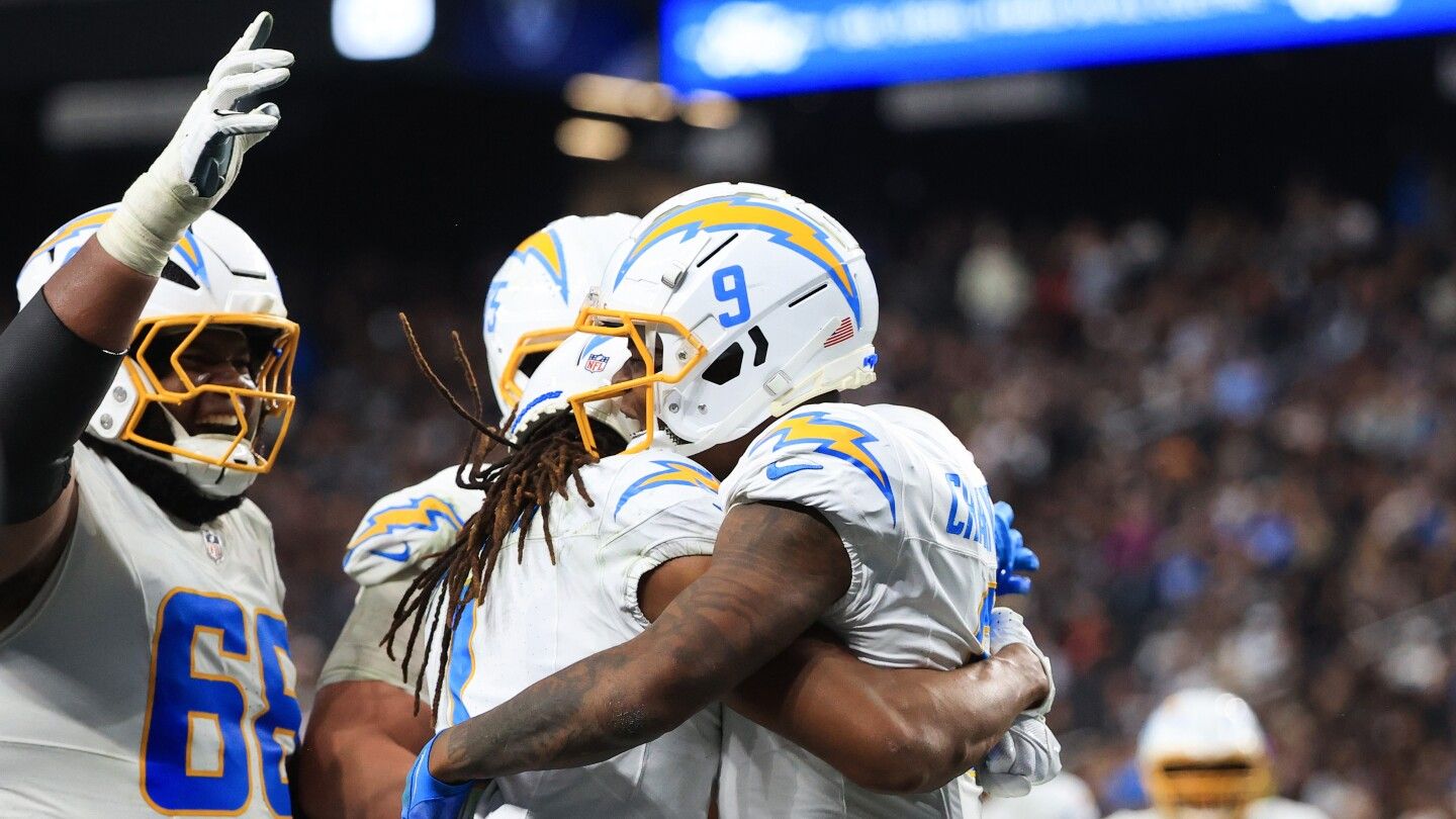 Quentin Johnston's career day helps Chargers secure fifth seed with 34-20 win over Raiders