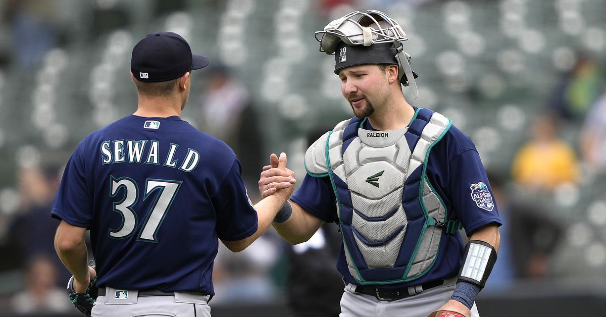 With a sigh of relief, Mariners win 5-3 to sweep Oakland