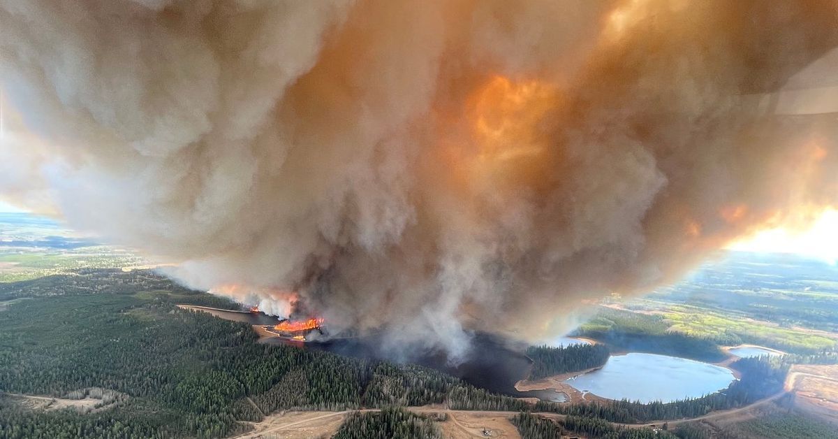 Fire and floods across western Canada force evacuations