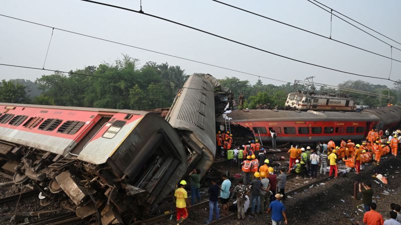 India train crash: Devastating scenes of despair after one of the worst train crashes the country has ever seen