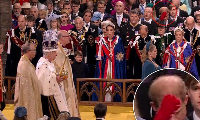 Royal fans speculate Prince Harry STOPPED singing God Save the King as his father walked past him