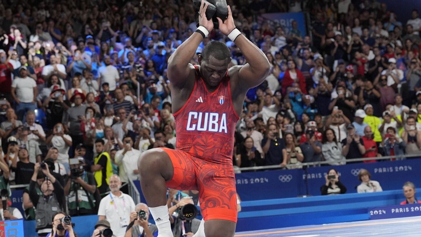 Cuban Greco-Roman wrestler Mijain Lopez wins record fifth straight gold, and then retires