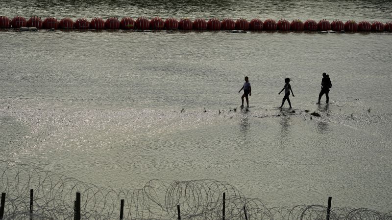 Federal judge orders Texas to remove floating barriers aimed at deterring migrants on Rio Grande