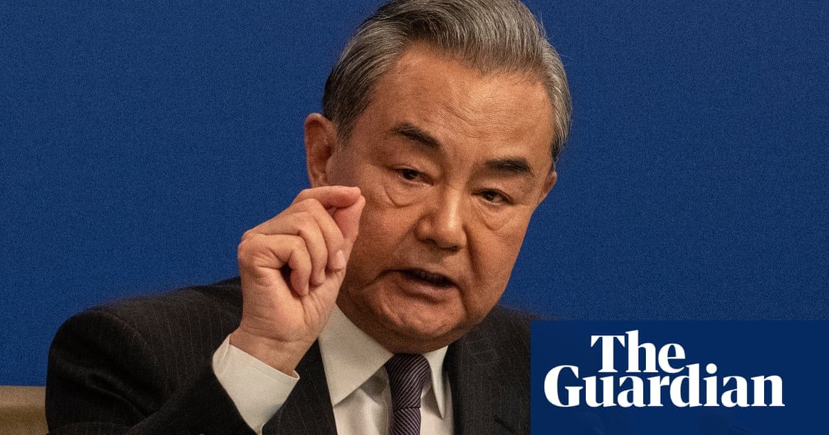 China’s foreign minister condemns US imposition of tariffs as ‘two-faced’