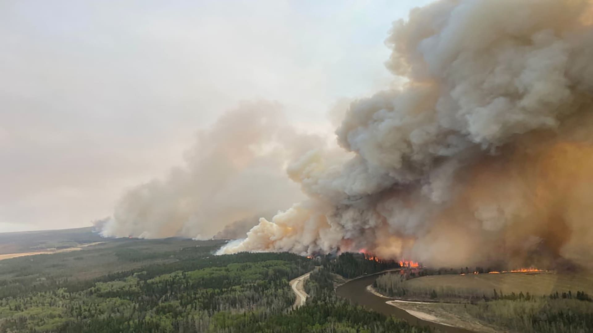 More than 24,000 people evacuated in Western Canada as 103 wildfires burn