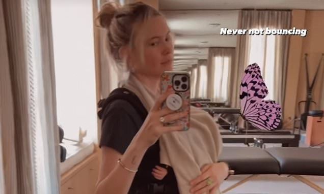 Behati Prinsloo shares a glimpse into her life as a 'mother of 3' as she holds her newborn baby