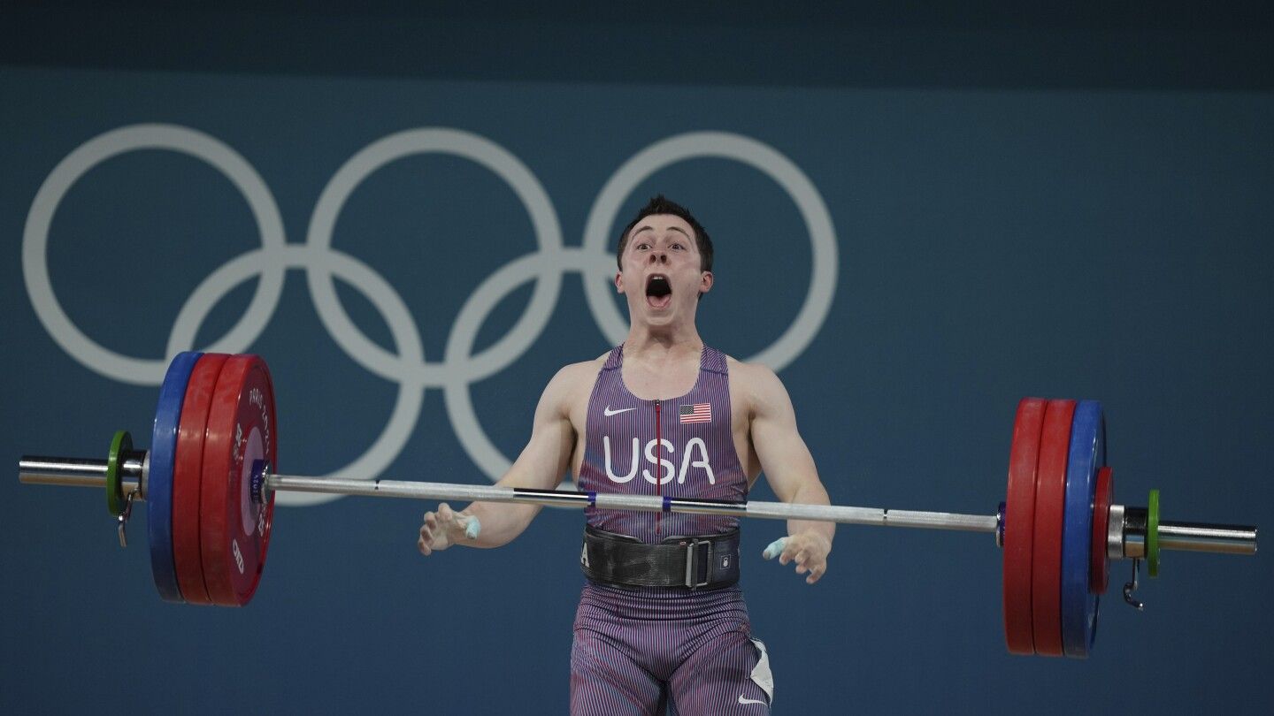 Hampton Morris is 1st US men's weightlifter to medal at the Olympics since '84. Li Fabin wins gold