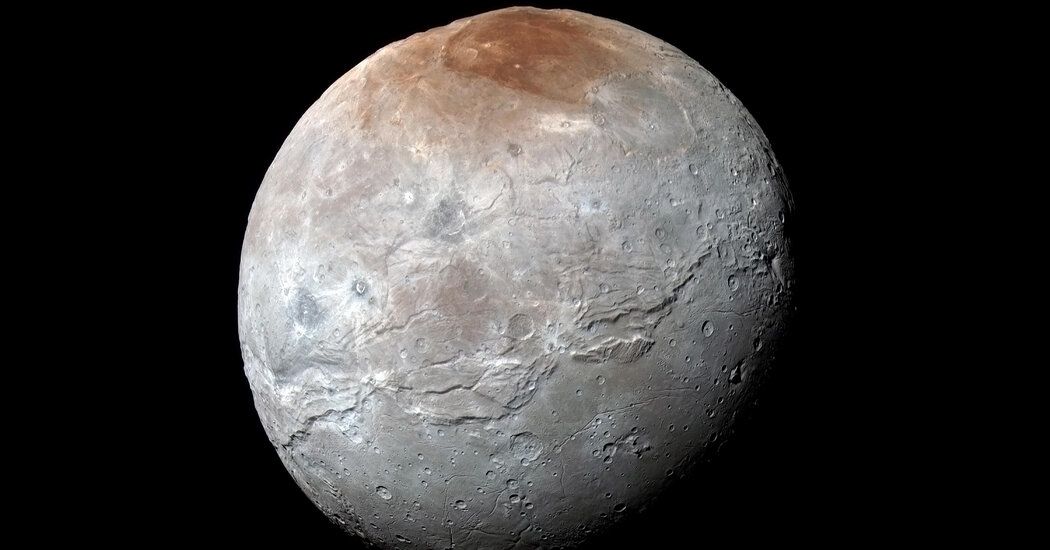 Pluto May Have Captured Its Biggest Moon Charon After an Ancient Dance and Kiss