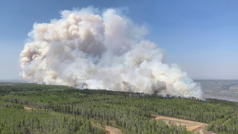 More than 29,000 people are evacuated from communities throughout Alberta as wildfires rage in Canada