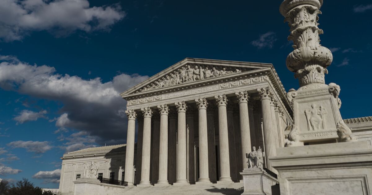 Supreme Court upholds Voting Rights Act in surprise ruling