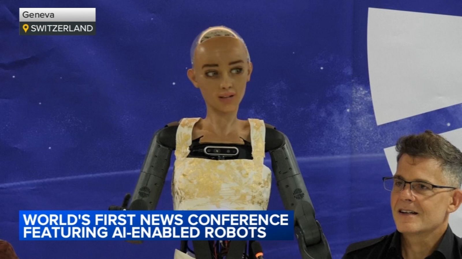 Humanoid robots take questions at a Geneva news conference