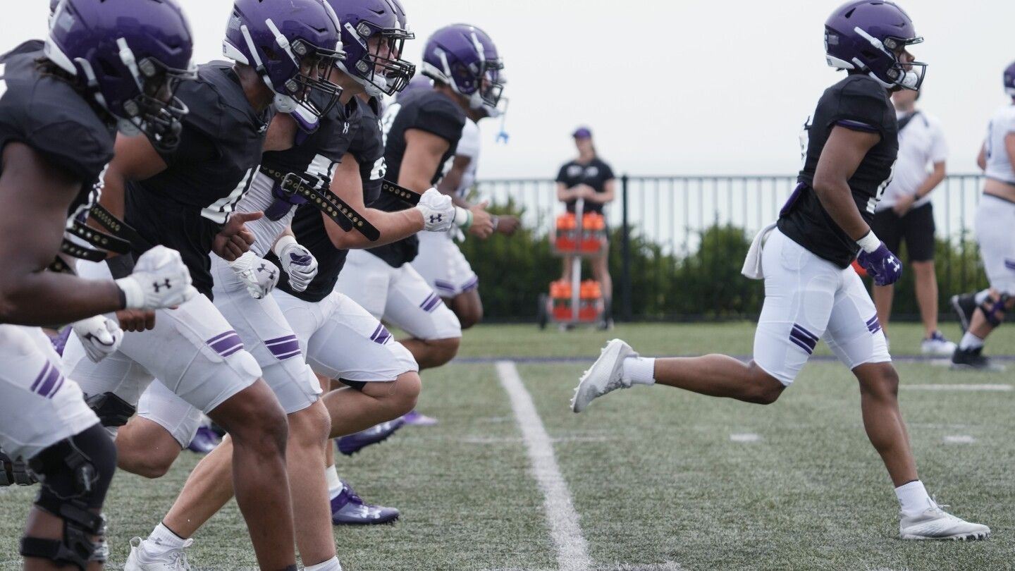 Northwestern athletic director blasts football staffers for 'tone deaf' shirts supporting Fitzgerald