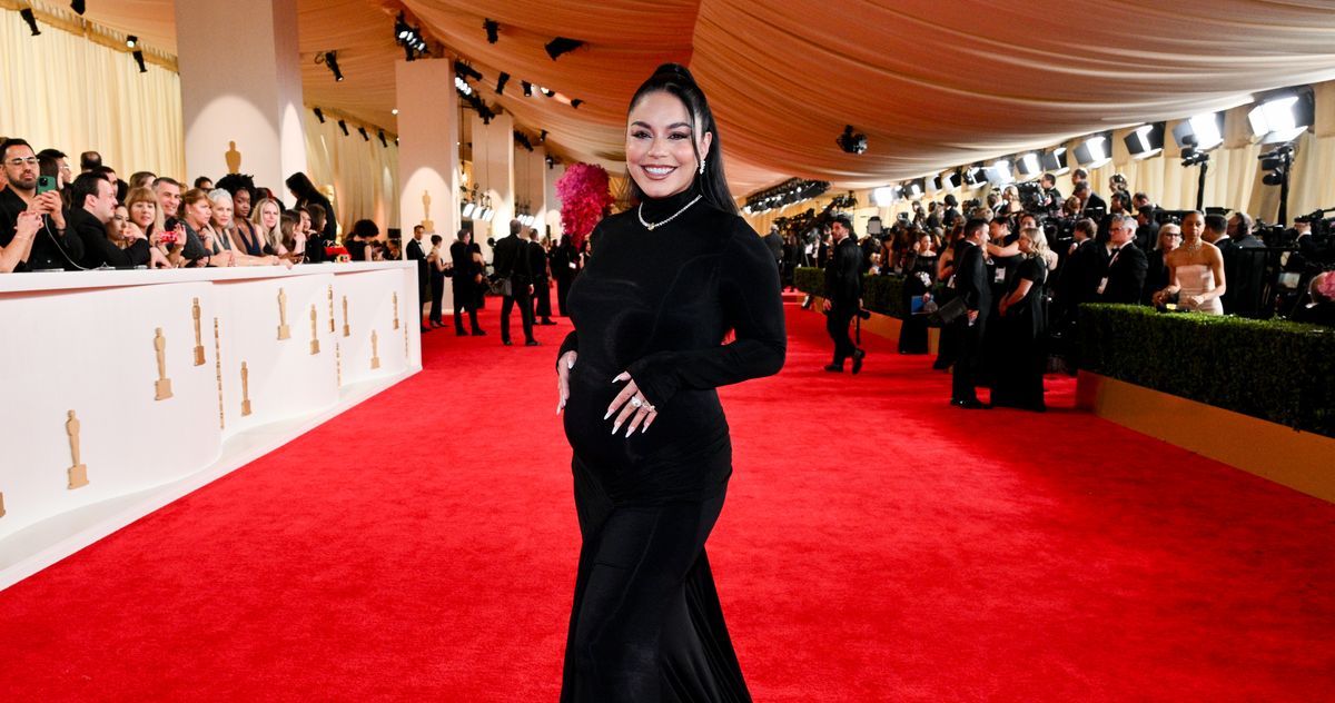 Vanessa Hudgens Unveils Baby Bump on the Oscars Red Carpet