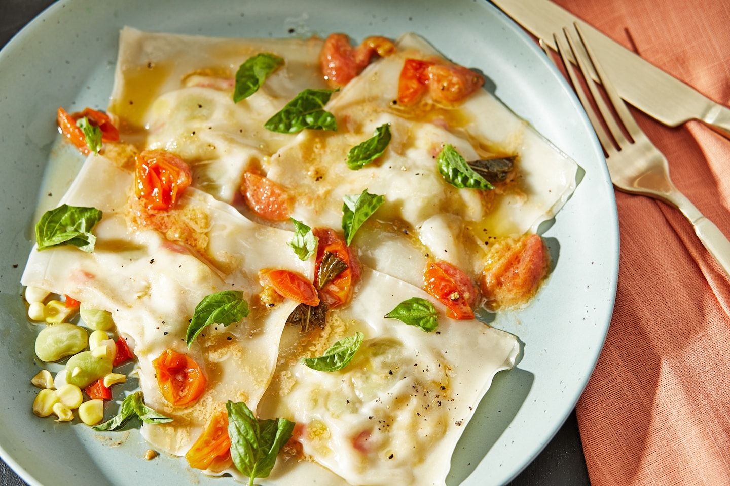 Succotash ravioli bathed in buttery tomato sauce is a summery stunner