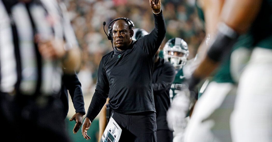 Michigan State Suspends Football Coach Amid Sexual Harassment Allegations