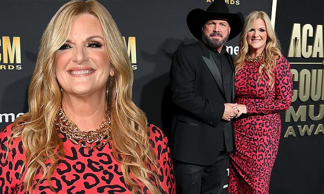 Trisha Yearwood stuns alongside her dapper husband Garth Brooks at the 2023 ACM Awards