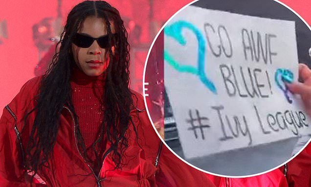 Beyonce's daughter Blue Ivy reacts to a fan-made sign for her at Renaissance concert in Barcelona