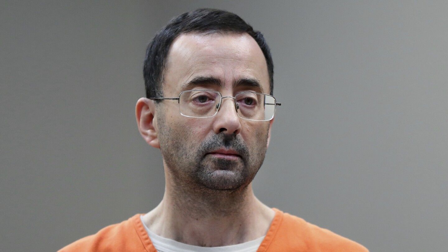 Larry Nassar was stabbed in prison cell, attack not seen by surveillance cameras, AP source says