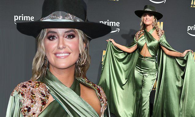 Yellowstone star Lainey Wilson WOWS in metallic green jumpsuit she walks ACM Awards red carpet