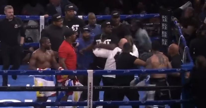 Floyd Mayweather, John Gotti III camps storm ring and brawl after Kenny Bayless calls off fight