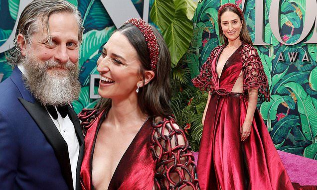 Sara Bareilles dons red Georges Chakra 'dream dress' at Tony Awards in NYC with fiancé Joe Tippett