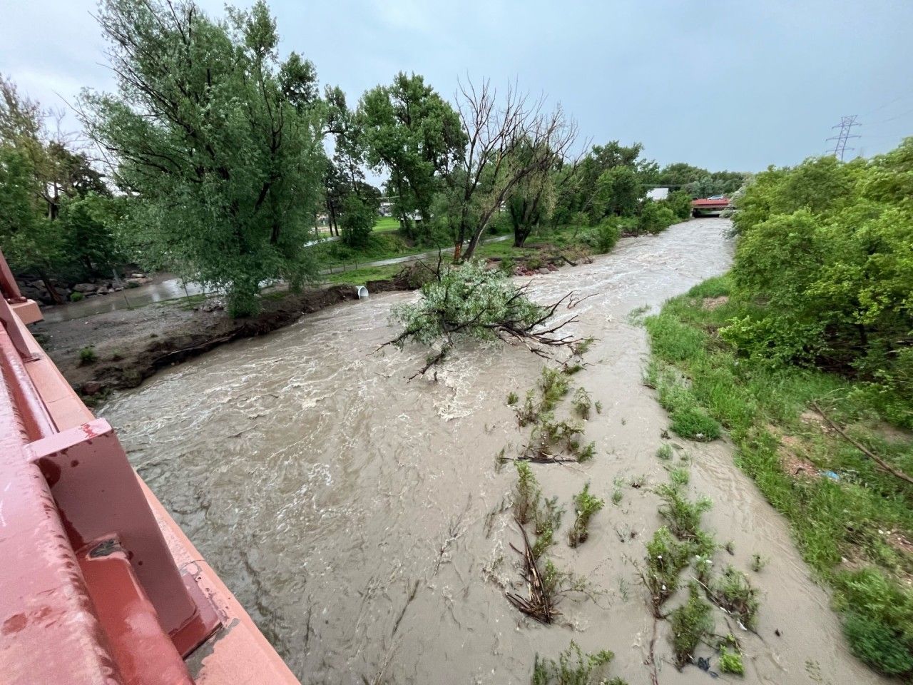 Flooding closes roads, tornado warning issued