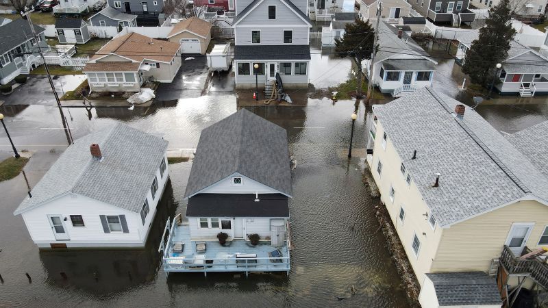 Vicious storm triggers historic coastal flooding with an Arctic chill chaser to battered US