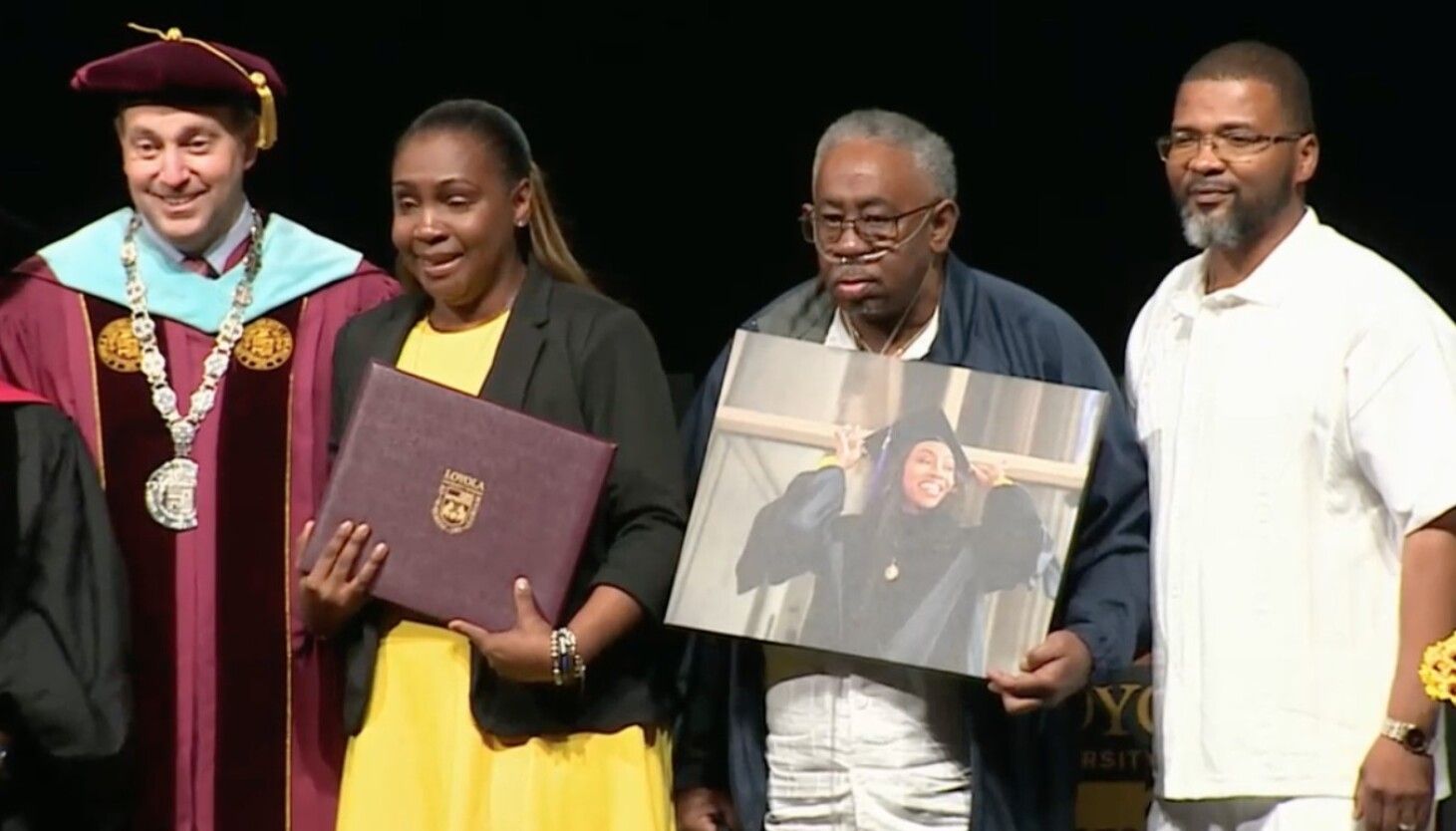 Mother of slain Chicago police Officer Aréanah Preston accepts her degree at Loyola commencement