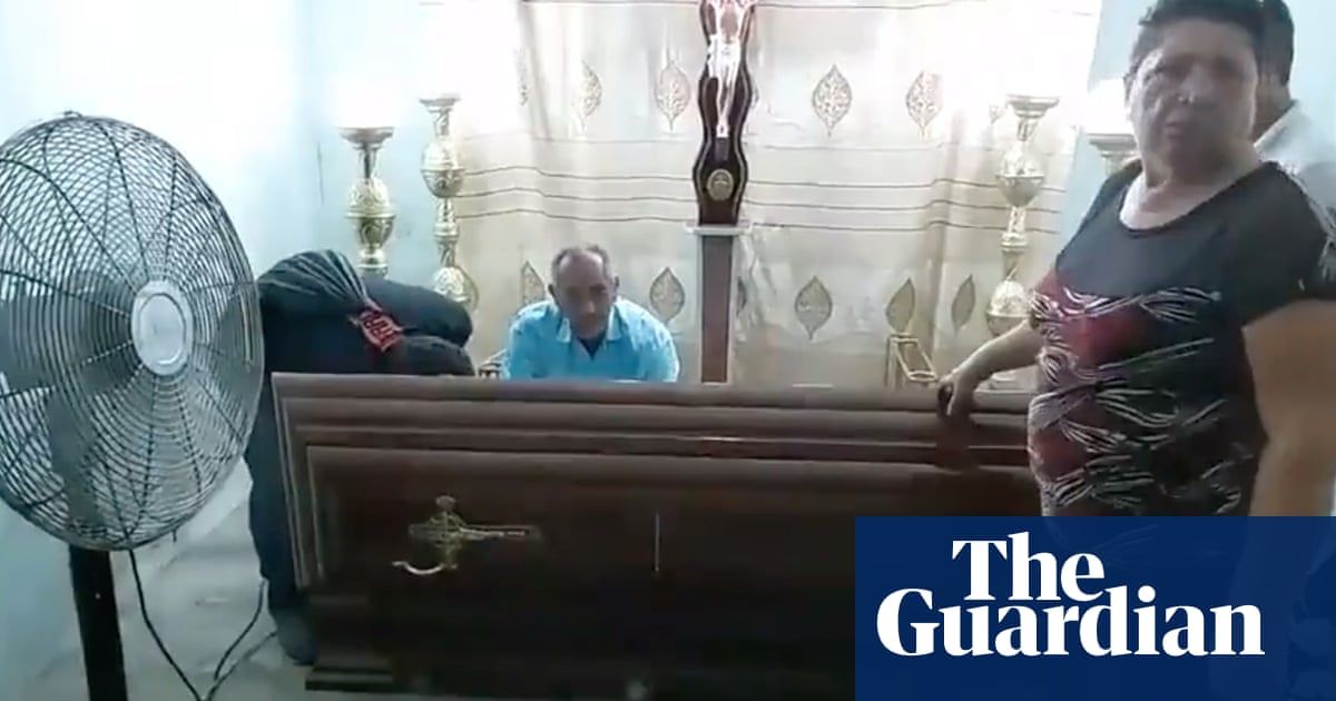 ‘Dead’ woman bangs on coffin during her own wake in Ecuador