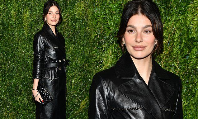 Camila Morrone stuns in long, black leather trench coat at Chanel Tribeca Artists Dinner in NYC