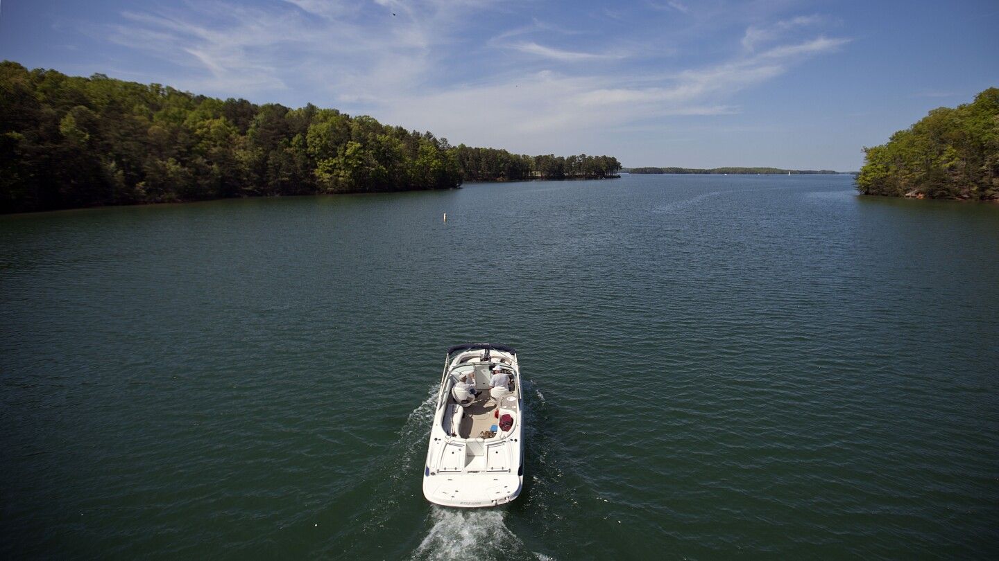 Usher's ex-wife wants to drain Georgia's largest lake, where a boater fatally struck her son