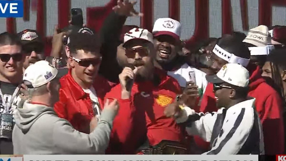 Travis Kelce is too drunk to SPEAK and has to be held up by his teammates on stage at Kansas City Chiefs' Super Bowl parade