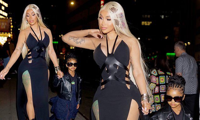 Cardi B dons futuristic outfit as she and daughter Kulture arrive at Mother's Day dinner in New York