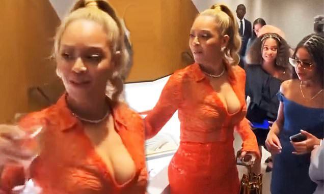 Beyonce stuns in figure-hugging orange dress alongside Blue Ivy at Jay-Z's Book of HOV exhibition