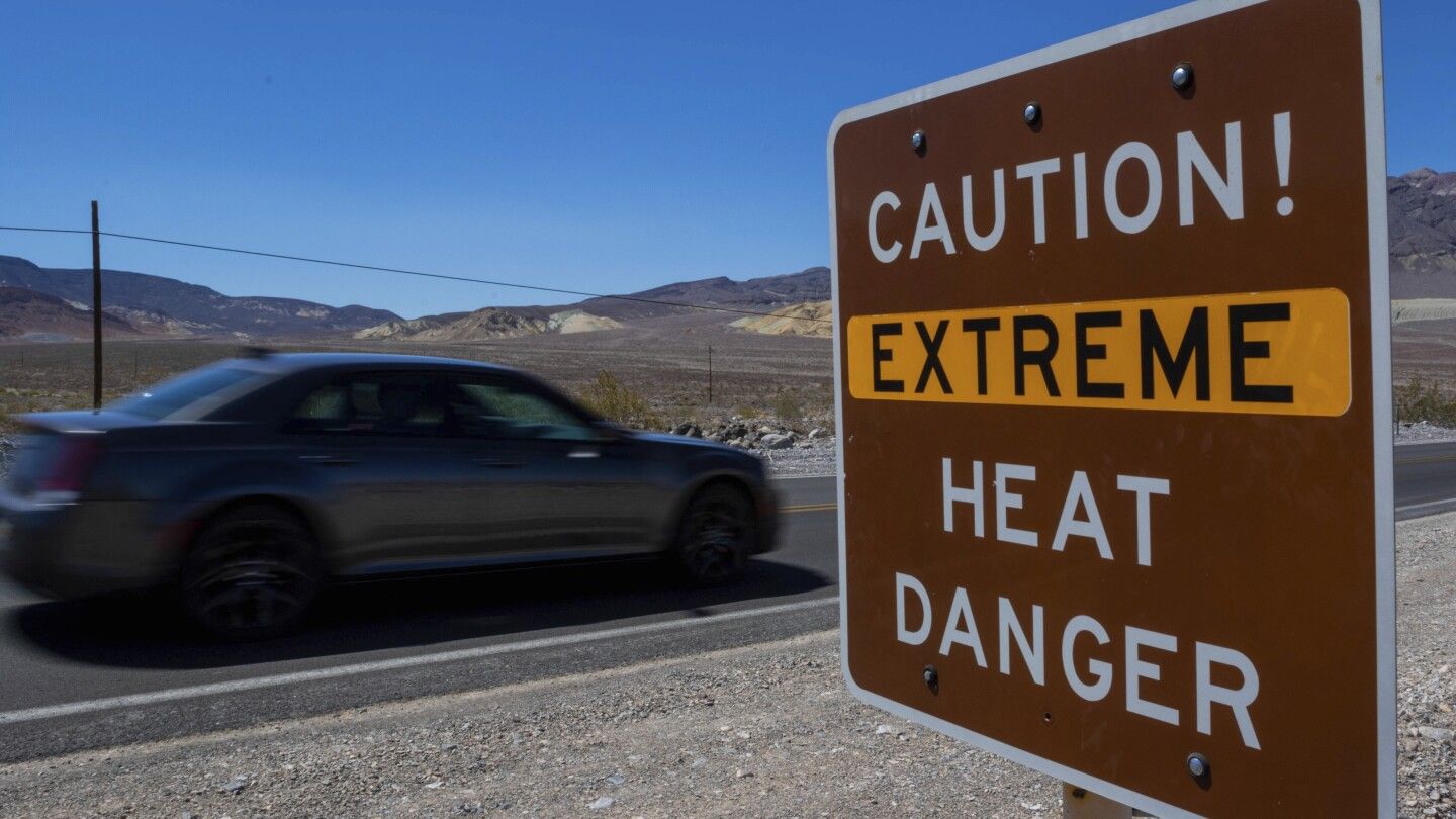 Heat wave: Death Valley visitors drawn to the hottest spot on Earth