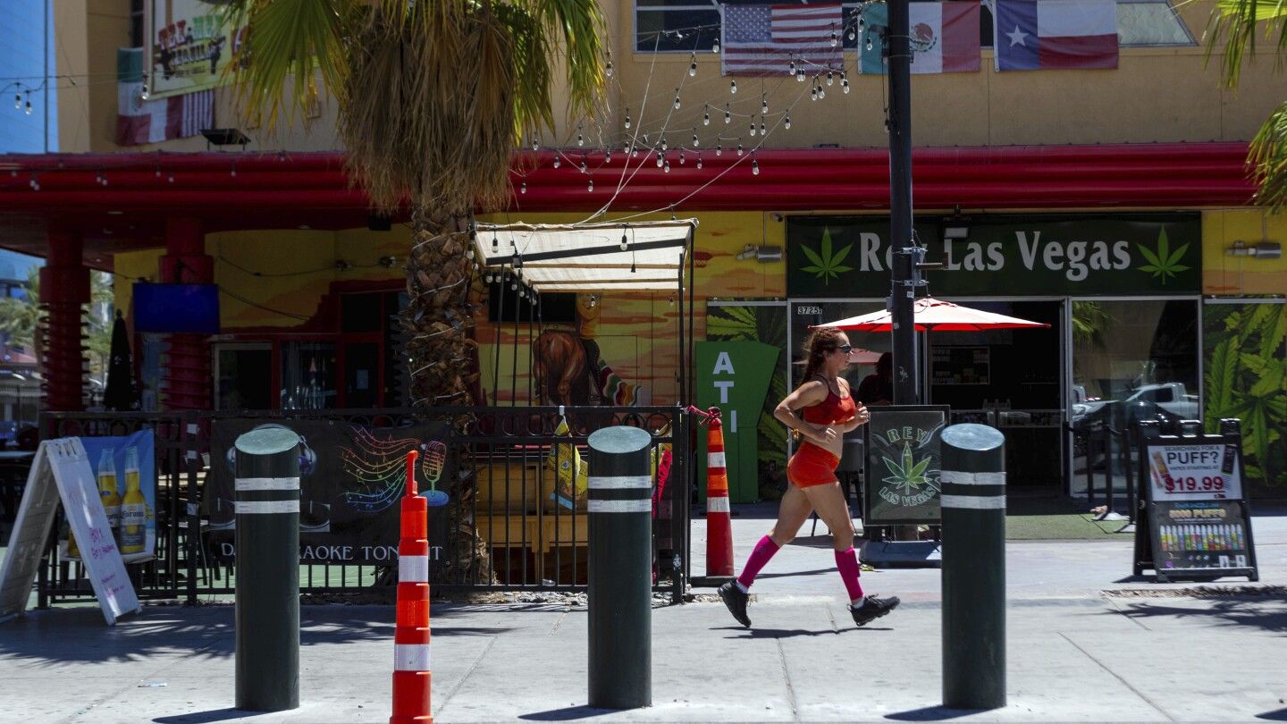 Heat wave could break Vegas record as visitors stay inside chilled casinos and ER doctors are busy